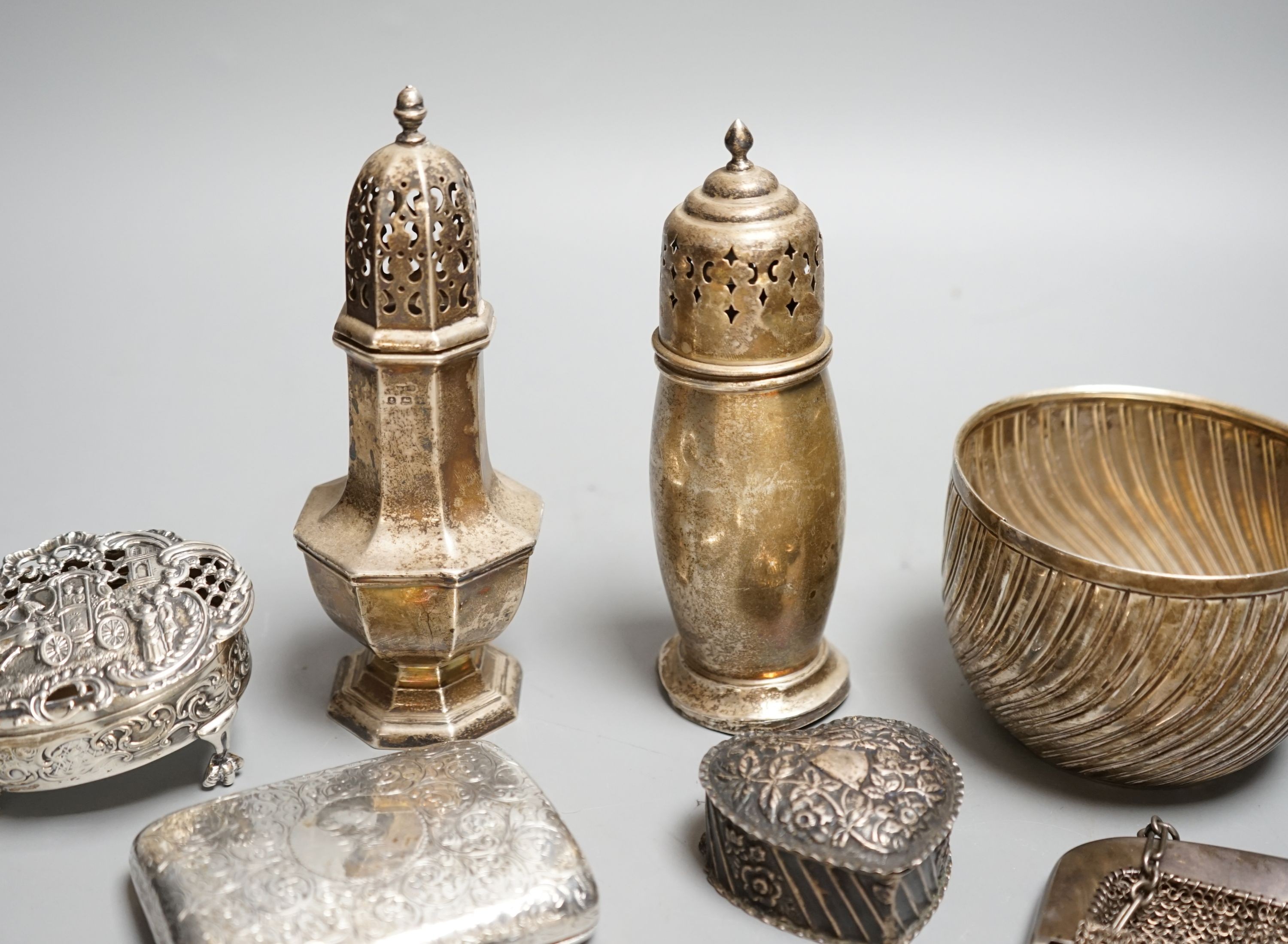 Small silver including a Victorian sugar bowl(split), two sugar casters, a pot pourri box(a.f.), cigarette case, caddy spoon etc.